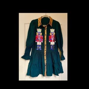 Green Dress with Nutcracker Design and Gold Accents